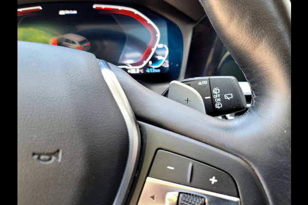 BMW 3 Serie Touring 320e Luxury - Pano, Trekhaak, Laser (NL NAP BTW)