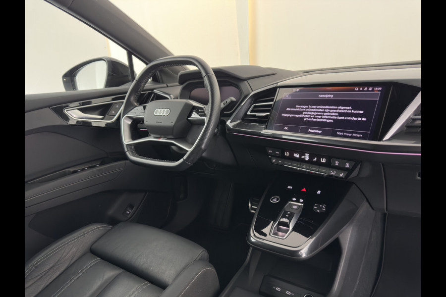 Audi Q4 e-tron 40 Launch edition S Competition 77 kWh [3-Fase-11kW] {SoH-89%} (INCL-BTW) (INCL.BTW) *HEAT-PUMP | HEAD-UP | LEATHER | MATRIX-LED | SONOS-SOUND | ADAPTIVE-CRUISE | HEATED-SPORTSEATS | AMBIENT-LIGHT | DIGI-COCKPIT | CAMERA | KEYLESS | DAB+ | TOWBAR | 20''ALU*