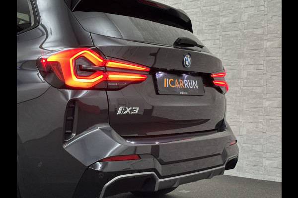 BMW iX3 M-Sport | Sophisto Grey! | Panorama | ACC | Leder | Memory | El. Trekhaak 97.6% SOH | Sfeerverlichting | 3-Zone Clima | Carplay | LED | Btw auto, 35400,= ex. | Rijklaar incl. Bovag garantie!