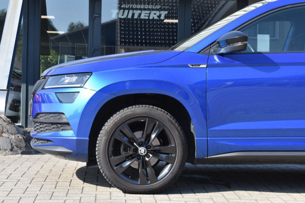 Škoda Karoq 1.5 TSI ACT Sportline | TREKHAAK | CANTON | ADAPTIEVE CRUISE CONTROLE | STOELVERWARMING | NAP | VOORRUITVERWARMING