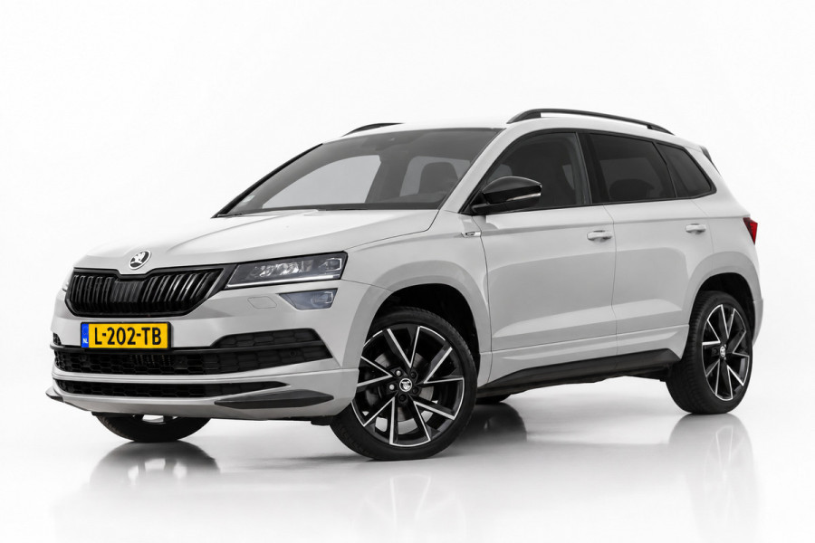Škoda Karoq 1.5 TSI ACT Sportline | TREKHAAK | ADAPTIEVE CRUISE CONTROLE | CAMERA | NAP | STOELVERWARMING | CANTON