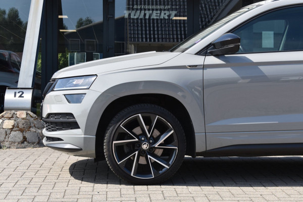 Škoda Karoq 1.5 TSI ACT Sportline | TREKHAAK | ADAPTIEVE CRUISE CONTROLE | CAMERA | NAP | STOELVERWARMING | CANTON