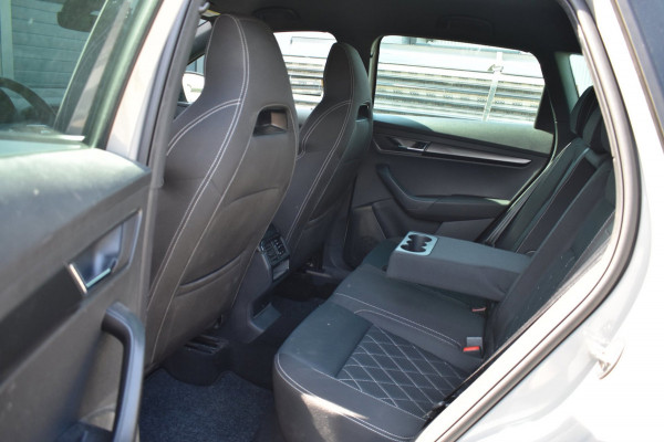 Škoda Karoq 1.5 TSI ACT Sportline | TREKHAAK | ADAPTIEVE CRUISE CONTROLE | CAMERA | NAP | STOELVERWARMING | CANTON