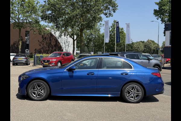 Mercedes-Benz C-Klasse 300 e AMG Line Limited PHEV | VAN € 42.900,- VOOR € 39.877,- | UW WK-VOORDEEL: € 3.023,- | PANORAMADAK | DISTRONIC (ACC) | ACHTERUITRIJCAMERA | DODEHOEKASSISTENT | AMBIENT LIGHTING | MERCEDES-DEALER ONDERHOUDEN | RIJKLAAR MET 12 MAANDEN BOVAG GARANTIE |