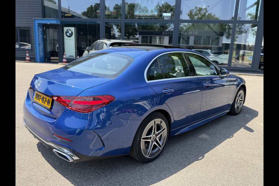 Mercedes-Benz C-Klasse 300 e AMG Line Limited PHEV | VAN € 42.900,- VOOR € 39.877,- | UW WK-VOORDEEL: € 3.023,- | PANORAMADAK | DISTRONIC (ACC) | ACHTERUITRIJCAMERA | DODEHOEKASSISTENT | AMBIENT LIGHTING | MERCEDES-DEALER ONDERHOUDEN | RIJKLAAR MET 12 MAANDEN BOVAG GARANTIE |