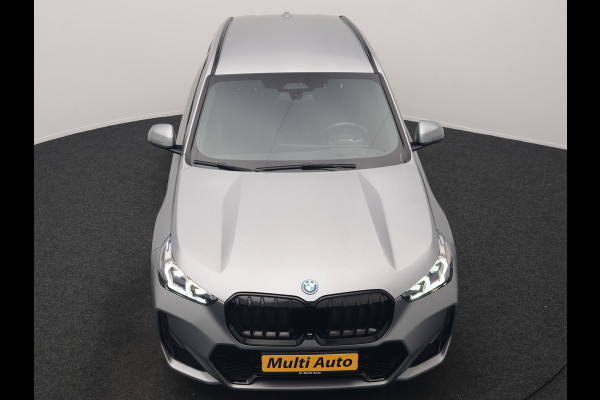 BMW X1 xDrive30e M Sport PHEV Frozen Pure Grey Metallic 326pk Dealer O.H | Trekhaak Af Fabriek | Adaptive Cruise | Head Up | Harman / Kardon | 360 Camera | Alcantara Sportstoelen Massage & Memory | Adaptive Onderstel | Widescreen Navi | Stoelen & Stuur Verwarmd | Blis | Keyless | Apple Carplay | Pilot Assist | Virtual | DAB | 19"L.M | Plug In Hybrid |