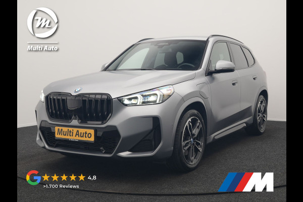 BMW X1 xDrive30e M Sport PHEV Frozen Pure Grey Metallic 326pk Dealer O.H | Trekhaak Af Fabriek | Adaptive Cruise | Head Up | Harman / Kardon | 360 Camera | Alcantara Sportstoelen Massage & Memory | Adaptive Onderstel | Widescreen Navi | Stoelen & Stuur Verwarmd | Blis | Keyless | Apple Carplay | Pilot Assist | Virtual | DAB | 19"L.M | Plug In Hybrid |