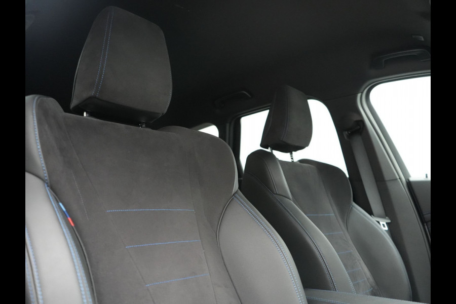 BMW X1 xDrive30e M Sport PHEV Frozen Pure Grey Metallic 326pk Dealer O.H | Trekhaak Af Fabriek | Adaptive Cruise | Head Up | Harman / Kardon | 360 Camera | Alcantara Sportstoelen Massage & Memory | Adaptive Onderstel | Widescreen Navi | Stoelen & Stuur Verwarmd | Blis | Keyless | Apple Carplay | Pilot Assist | Virtual | DAB | 19"L.M | Plug In Hybrid |