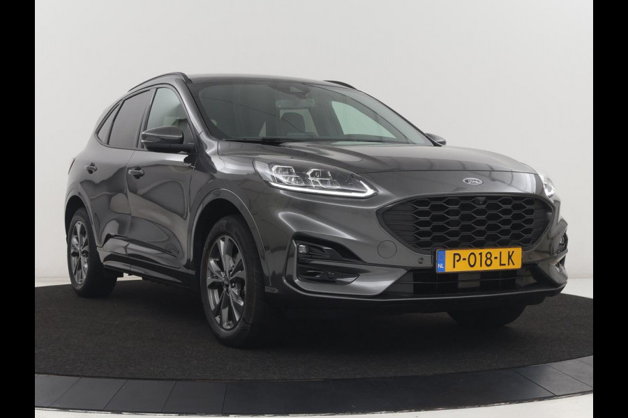 Ford Kuga 2.5 PHEV ST-Line | SOH 94,5% | Adaptive cruise | Leder/Alcantara | Camera | Carplay | Side Assist | Navigatie | Keyless | Parkeerhulp | Elektrische kofferklep | Climate control | Plug In