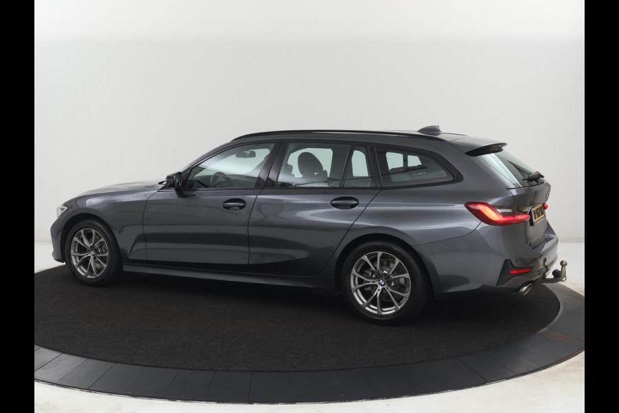 BMW 3-serie 320i Executive Edition | Sport Line | Trekhaak | Harman/Kardon | Sfeerverlichting | Carplay | Half leder | Live Cockpit | Parkeerhulp | Navigatie | Climate control | Full LED | Bluetooth | Cruise control
