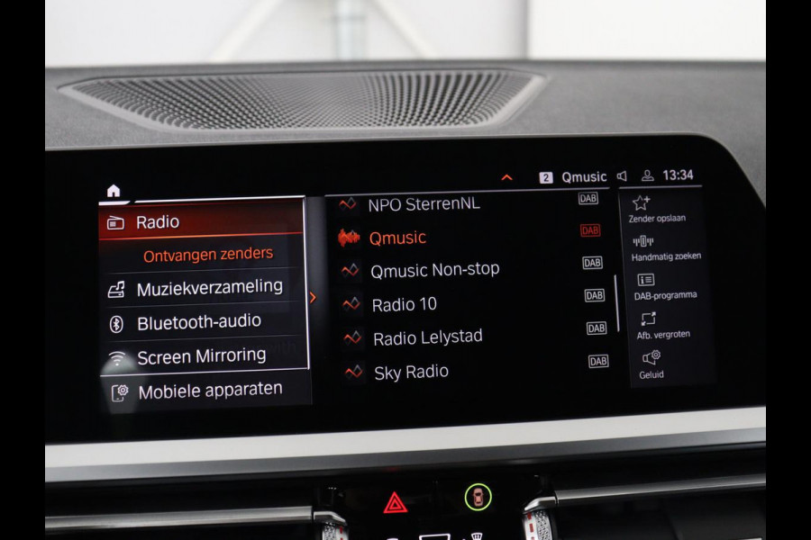 BMW 3-serie 320i Executive Edition | Sport Line | Trekhaak | Harman/Kardon | Sfeerverlichting | Carplay | Half leder | Live Cockpit | Parkeerhulp | Navigatie | Climate control | Full LED | Bluetooth | Cruise control