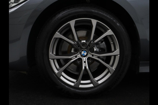 BMW 3-serie 320i Executive Edition | Sport Line | Trekhaak | Harman/Kardon | Sfeerverlichting | Carplay | Half leder | Live Cockpit | Parkeerhulp | Navigatie | Climate control | Full LED | Bluetooth | Cruise control