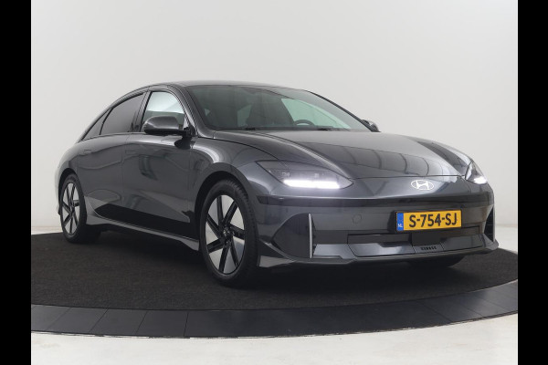 Hyundai IONIQ 6 Connect 77.4 kWh | SOH 94,7% | Warmtepomp | Head-Up | Stoelverwarming | Camera | Carplay | Standkachel | Adaptive cruise | Keyless | Navigatie | Achterbankverwarming | Full LED