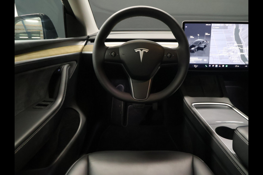 Tesla Model Y RWD 58 kWh [PANORAMADAK, APPLE CARPLAY, ANDROID AUTO, ELEKTRISCHE STOELEN, PDC, CAMERA, STOELVERWARMING, STUURVERWARMING, KEYLESS ENTRY, KEYLESS START, DODEHOEKDETECTIE, CLIMATE CONTROL, NIEUWSTAAT]