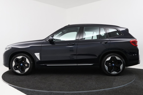 BMW iX3 High Executive 80 kWh (PANO, 360 CAMERA, H/K AUDIO, SFEERVERLICHTING, ADAPTIVE CRUISE, TREKHAAK WEGKLAPBAAR, AUTOPILOT)