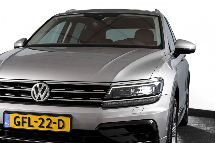 Volkswagen Tiguan 2.0 TSI 4Motion Highline Business R 180 PK | R-Line | Elek. Trekhaak | Adapt. Cruise | Stoel-+Bankverw. | PDC | Camera | NAV + App. Connect | ECC | Elek. Klep | LM 19" |
