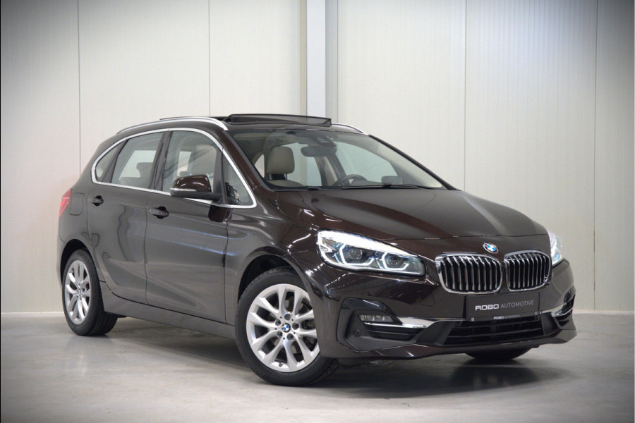 BMW 2 Serie Active Tourer 218i High Executive Luxury Line | Panoramadak | Stoelverwarming | Head-Up Display | Parkeersensoren | Navigatie | Trekhaak | Cruise Control | Climate Control | NAP