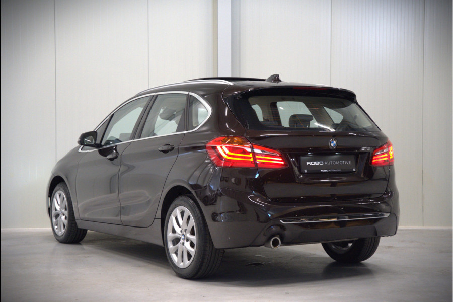 BMW 2 Serie Active Tourer 218i High Executive Luxury Line | Panoramadak | Stoelverwarming | Head-Up Display | Parkeersensoren | Navigatie | Trekhaak | Cruise Control | Climate Control | NAP