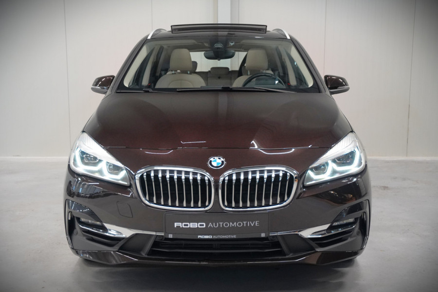 BMW 2 Serie Active Tourer 218i High Executive Luxury Line | Panoramadak | Stoelverwarming | Head-Up Display | Parkeersensoren | Navigatie | Trekhaak | Cruise Control | Climate Control | NAP