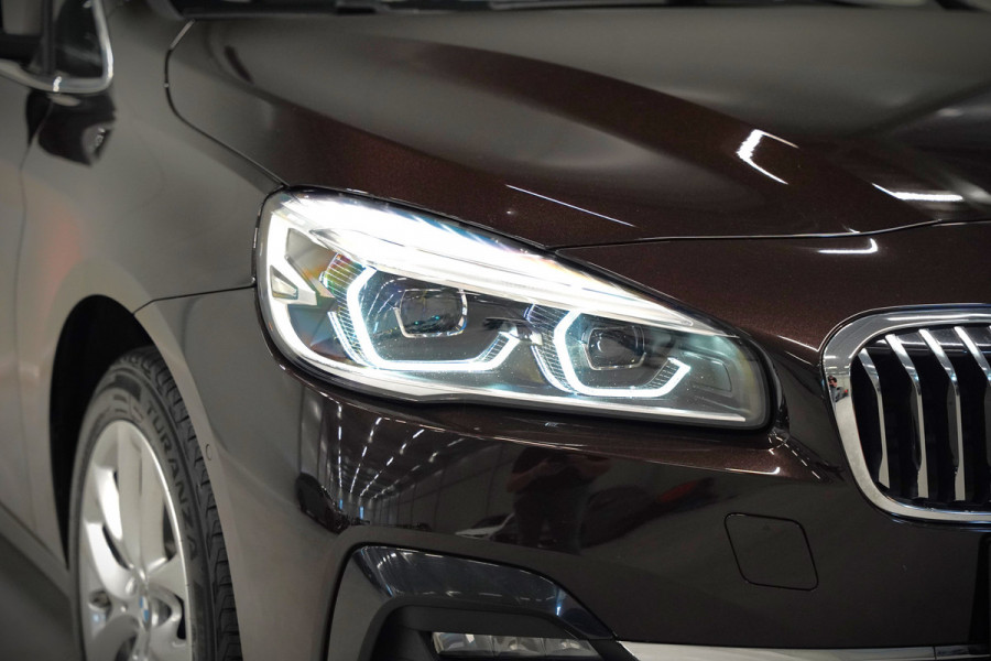 BMW 2 Serie Active Tourer 218i High Executive Luxury Line | Panoramadak | Stoelverwarming | Head-Up Display | Parkeersensoren | Navigatie | Trekhaak | Cruise Control | Climate Control | NAP