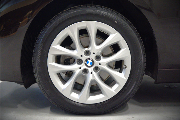 BMW 2 Serie Active Tourer 218i High Executive Luxury Line | Panoramadak | Stoelverwarming | Head-Up Display | Parkeersensoren | Navigatie | Trekhaak | Cruise Control | Climate Control | NAP