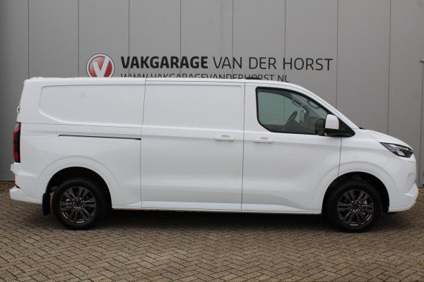 Ford E-Transit Custom ELEKTRISCH 320 L2H1 Limited 65 kWh 218 pk Meerprijs 17" lichtmetalen wielen €. 1.500,- Autm. airco, stoel-, spiegel- en voorraamverw., camera, trekhaak, cruise cntrl, navigatie by Apple Carplay/ Android auto, telefoonvoorb., LED verl. etc.
