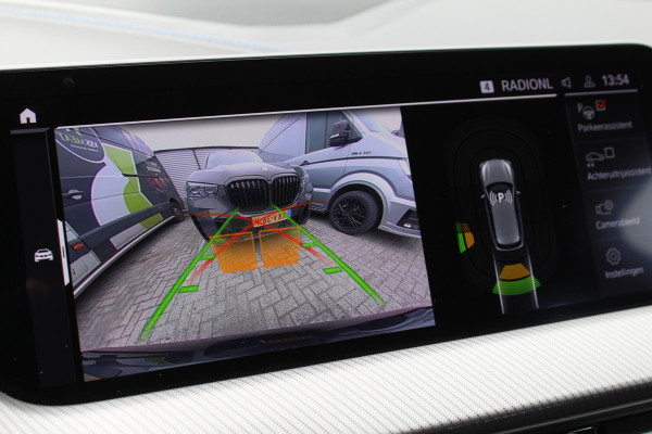 BMW 1-serie 118i Business Edition | M-Sport | Origin NL | Camera | Trekhaak | Navigatie