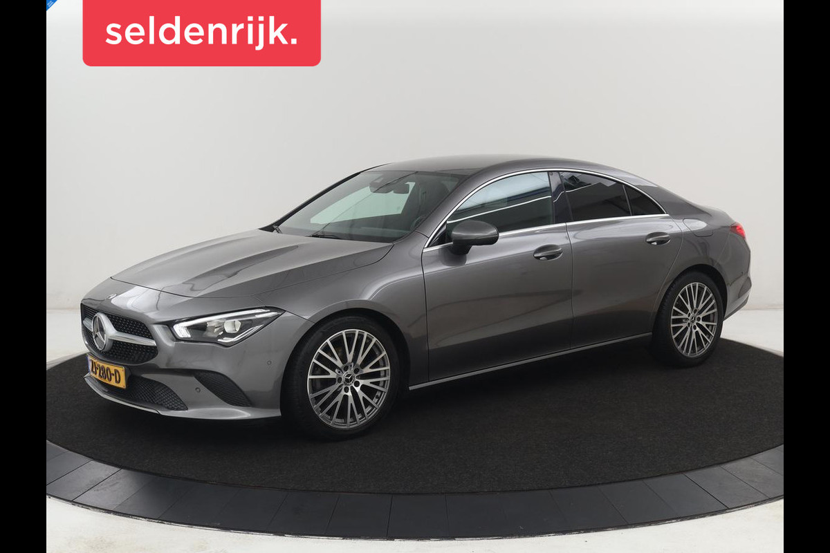 Mercedes-Benz CLA-Klasse 180 Business Solution Progressive | Stoelverwarming | Carplay | Sfeerverlichting | Half leder | Camera | Navigatie | Widescreen | Full LED | Park Assist | DAB | 18'' velgen | Cruise control