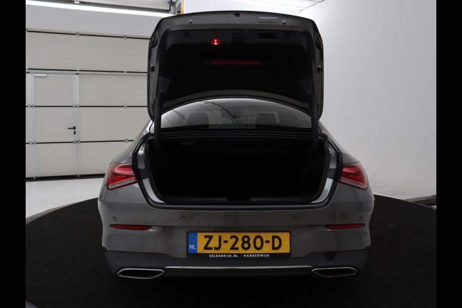 Mercedes-Benz CLA-Klasse 180 Business Solution Progressive | Stoelverwarming | Carplay | Sfeerverlichting | Half leder | Camera | Navigatie | Widescreen | Full LED | Park Assist | DAB | 18'' velgen | Cruise control