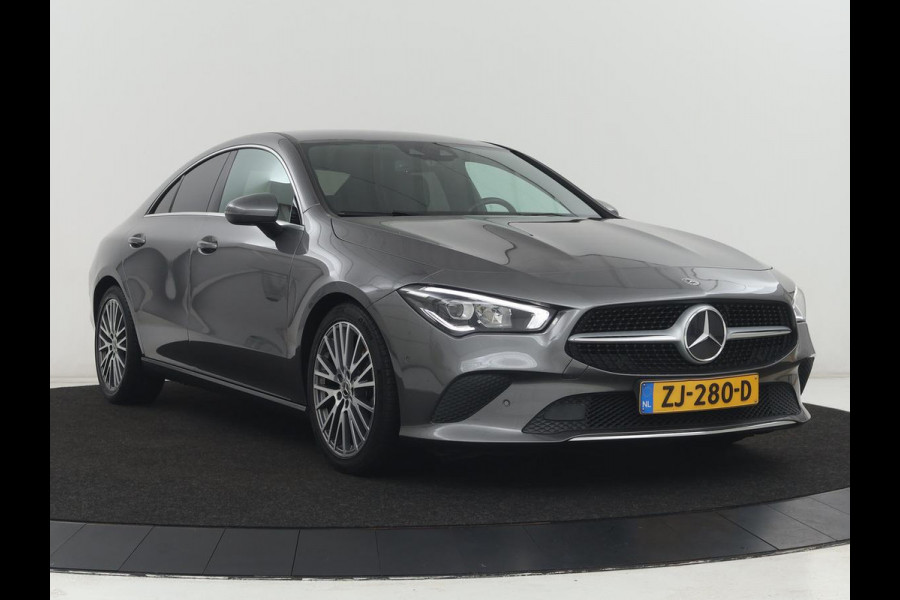 Mercedes-Benz CLA-Klasse 180 Business Solution Progressive | Stoelverwarming | Carplay | Sfeerverlichting | Half leder | Camera | Navigatie | Widescreen | Full LED | Park Assist | DAB | 18'' velgen | Cruise control