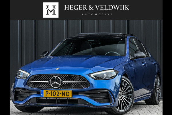 Mercedes-Benz C-Klasse 180 AMG Line | NL-Auto | Panoramadak | Night-Pakket | Ambiance Interieur | Camera | Elektr. Verst. Voorstoelen + Verwarming |