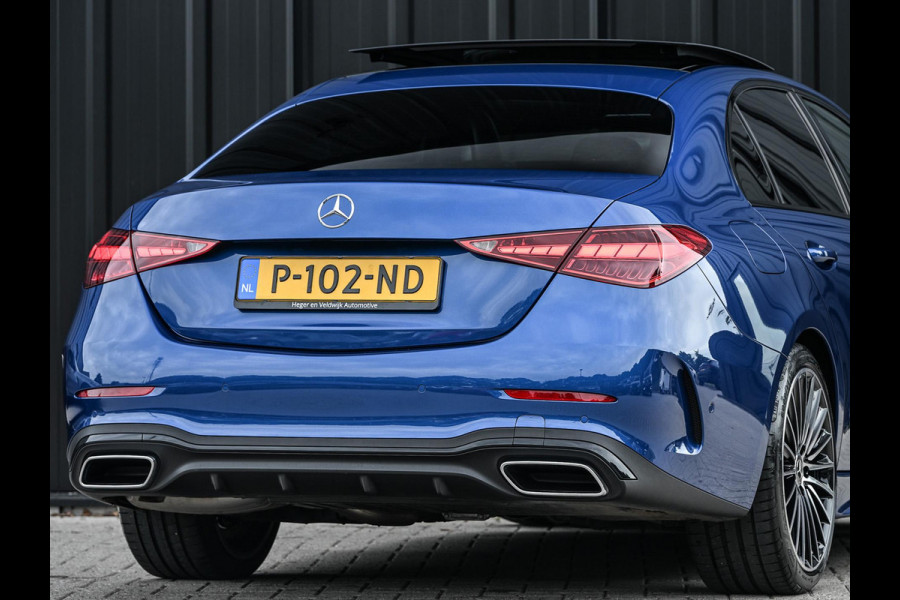 Mercedes-Benz C-Klasse 180 AMG Line | NL-Auto | Panoramadak | Night-Pakket | Ambiance Interieur | Camera | Elektr. Verst. Voorstoelen + Verwarming |