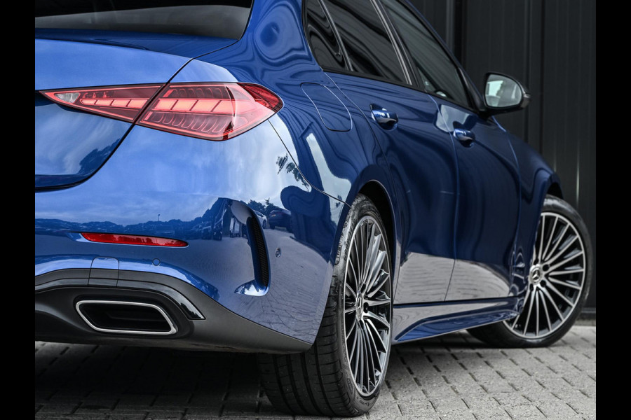 Mercedes-Benz C-Klasse 180 AMG Line | NL-Auto | Panoramadak | Night-Pakket | Ambiance Interieur | Camera | Elektr. Verst. Voorstoelen + Verwarming |