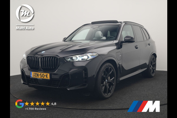 BMW X5 xDrive50e M Sport PHEV 490pk Dealer O.H. | Panodak | Luchtvering | Adaptive Cruise | Head Up | 360 Camera | Harman / Kardon | Lederen Sportstoelen Memory & Verwarmd | Sfeerverlichting | Apple Carplay | Keyless | Blis | 20"L.M | Plug