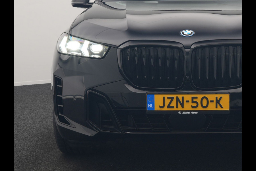 BMW X5 xDrive50e M Sport PHEV 490pk Dealer O.H. | Panodak | Luchtvering | Adaptive Cruise | Head Up | 360 Camera | Harman / Kardon | Lederen Sportstoelen Memory & Verwarmd | Sfeerverlichting | Apple Carplay | Keyless | Blis | 20"L.M | Plug