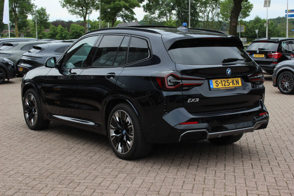 BMW iX3 High Executive 80 kWh / SoH 95,6% / Trekhaak / Panoramadak / 360Camera / Head-up / 20'' / Leder / Harman Kardon / Sfeerverlichting / Dodehoek / DAB / Stoelverwarming / ACC