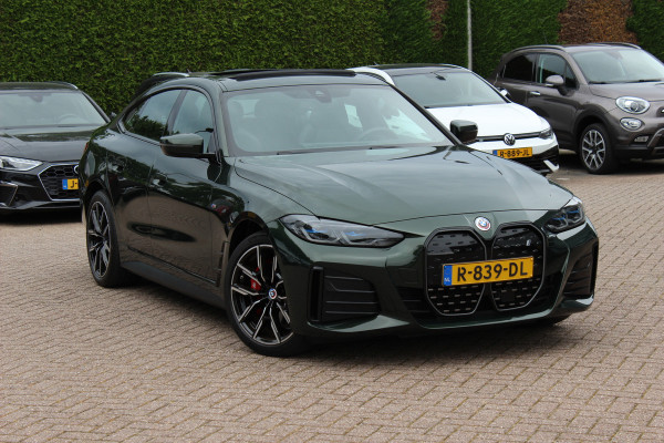 BMW i4 eDrive40 High Executive 84 kWh / SoH 99% / Trekhaak / Schuifdak / Camera / Head-up / Leder / 19'' / CarPlay / Stoelverwarming / Sfeerverlichting / Dodehoek / ACC