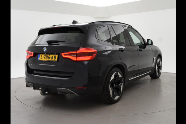 BMW iX3 HIGH EXECUTIVE 80 kWh + TREKHAAK | PANORAMA | 360 CAMERA | ADAPTIVE CRUISE | SFEERVERLICHTING
