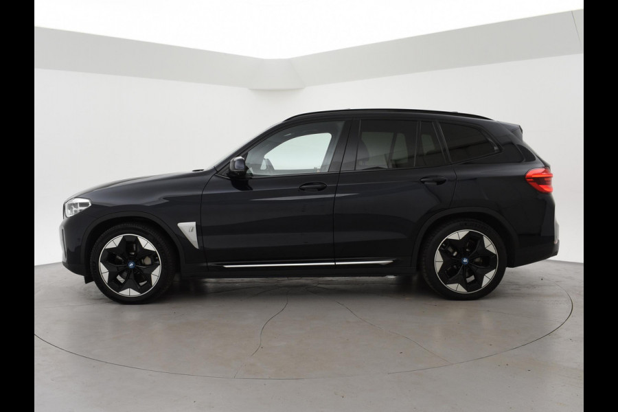 BMW iX3 HIGH EXECUTIVE 80 kWh + TREKHAAK | PANORAMA | 360 CAMERA | ADAPTIVE CRUISE | SFEERVERLICHTING