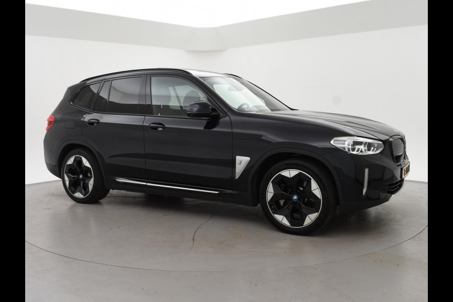 BMW iX3 HIGH EXECUTIVE 80 kWh + TREKHAAK | PANORAMA | 360 CAMERA | ADAPTIVE CRUISE | SFEERVERLICHTING