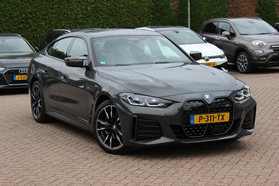 BMW i4 M50 High Executive 84 kWh / 360Camera / Head-up / Leder / Harman Kardon / Carbon intr.+extr. / 19'' / CarPlay / Stoelverwarming / Dodehoek / DAB / Cruise Control Adaptief