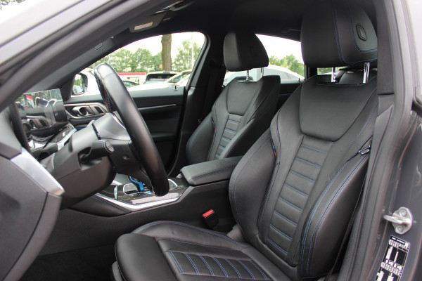BMW i4 M50 High Executive 84 kWh / 360Camera / Head-up / Leder / Harman Kardon / Carbon intr.+extr. / 19'' / CarPlay / Stoelverwarming / Dodehoek / DAB / Cruise Control Adaptief