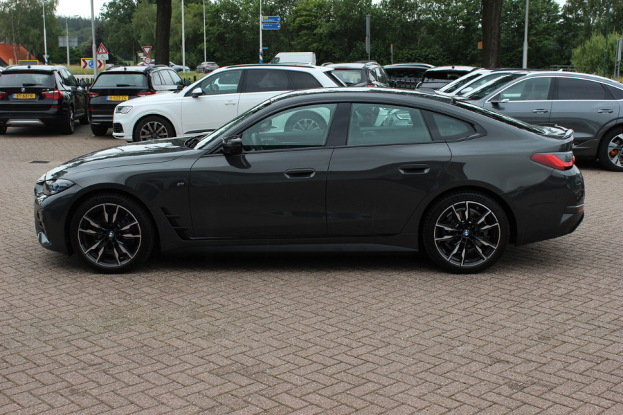 BMW i4 M50 High Executive 84 kWh / 360Camera / Head-up / Leder / Harman Kardon / Carbon intr.+extr. / 19'' / CarPlay / Stoelverwarming / Dodehoek / DAB / Cruise Control Adaptief