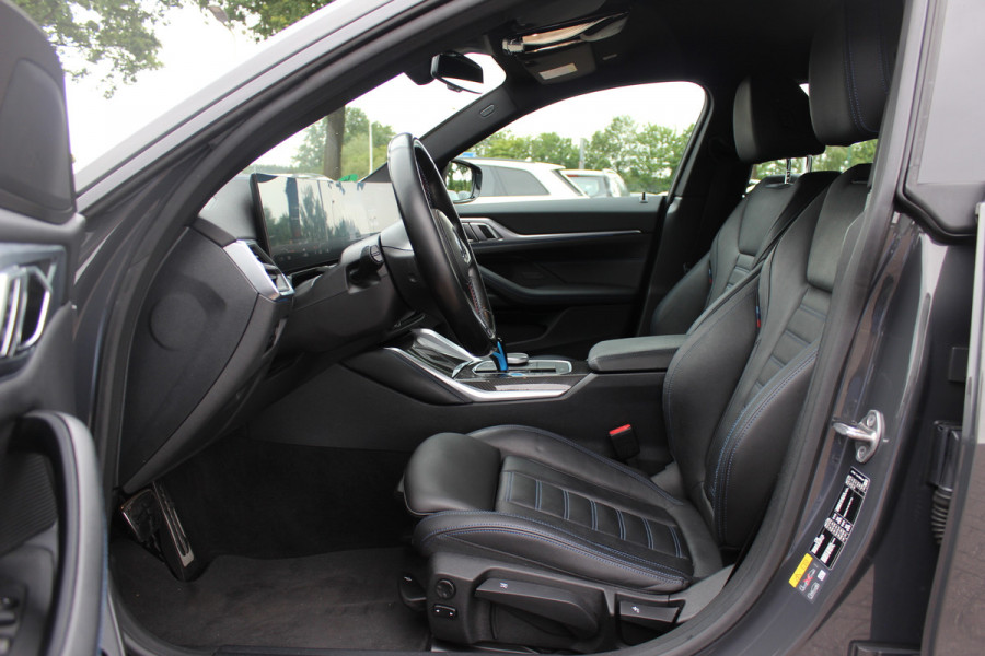 BMW i4 M50 High Executive 84 kWh / 360Camera / Head-up / Leder / Harman Kardon / Carbon intr.+extr. / 19'' / CarPlay / Stoelverwarming / Dodehoek / DAB / Cruise Control Adaptief