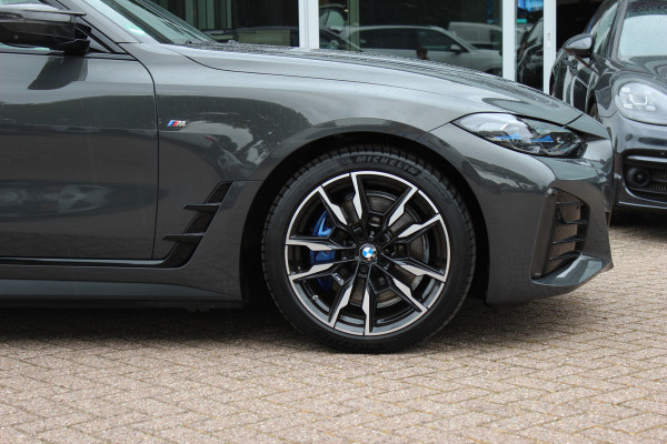 BMW i4 M50 High Executive 84 kWh / 360Camera / Head-up / Leder / Harman Kardon / Carbon intr.+extr. / 19'' / CarPlay / Stoelverwarming / Dodehoek / DAB / Cruise Control Adaptief