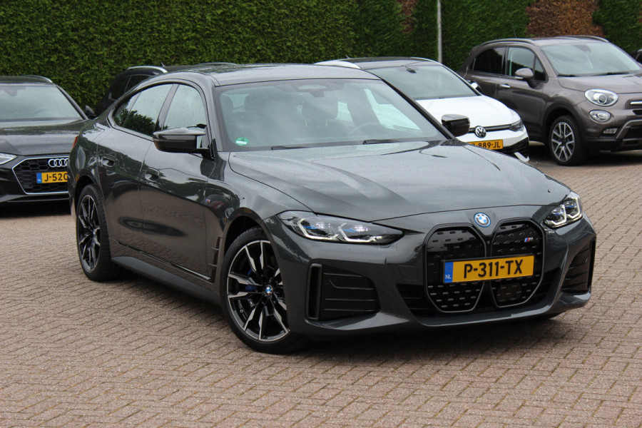 BMW i4 M50 High Executive 84 kWh / 360Camera / Head-up / Leder / Harman Kardon / Carbon intr.+extr. / 19'' / CarPlay / Stoelverwarming / Dodehoek / DAB / Cruise Control Adaptief