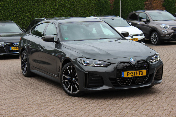 BMW i4 M50 High Executive 84 kWh / 360Camera / Head-up / Leder / Harman Kardon / Carbon intr.+extr. / 19'' / CarPlay / Stoelverwarming / Dodehoek / DAB / Cruise Control Adaptief