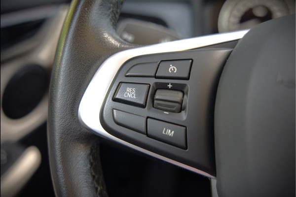 BMW 2 Serie Active Tourer 218i High Executive Luxury Line | Panoramadak | Stoelverwarming | Head-Up Display | Parkeersensoren | Navigatie | Trekhaak | Cruise Control | Climate Control | NAP