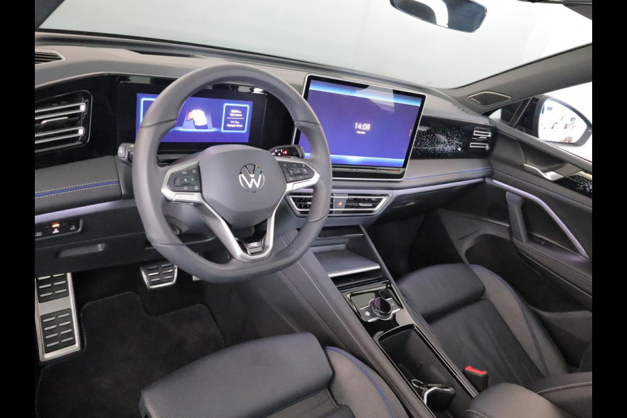 Volkswagen Tiguan 1.5 eHybrid R-Line Edition 272 pk Automaat (DSG) | Verlengde garantie | Navigatie | Panoramadak | Trekhaak (wegklapbaar) | Parkeersensoren (Park assist) | Rondomzicht camera | Lederen bekleding | Stoelverwarming/ventilatie |