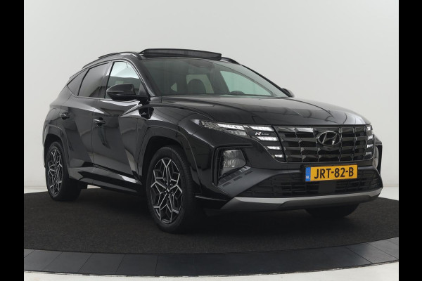 Hyundai Tucson 1.6 T-GDI PHEV N Line Sky 4WD | Pano | SOH 97,3% Stoelverwarming | Leder/Alcantara | Camera | Adaptive cruise | Carplay | Full LED | Stuurverwarming | Keyless | Plug In